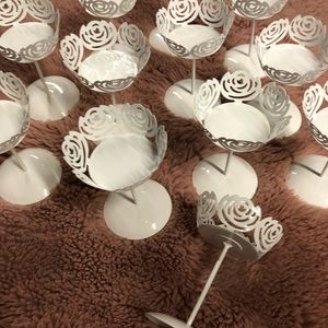 White metal decorative cupcake holders.
